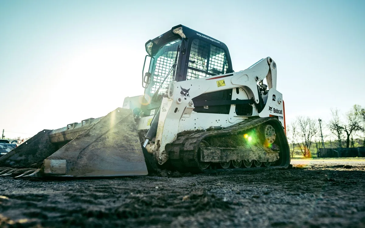 Compact tracked loader for specialised site work